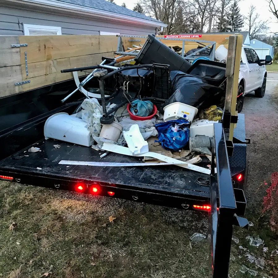 Roll-off dumpster delivered to a residential driveway in Mulberry