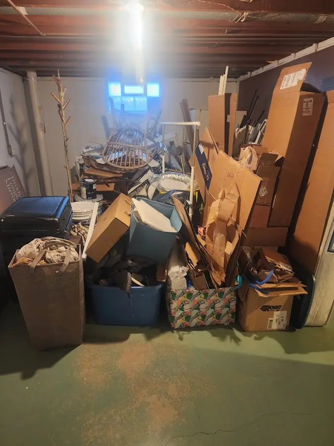 Roll-off dumpster container at job site for 2 Yard Dumpster Rental in Mulberry